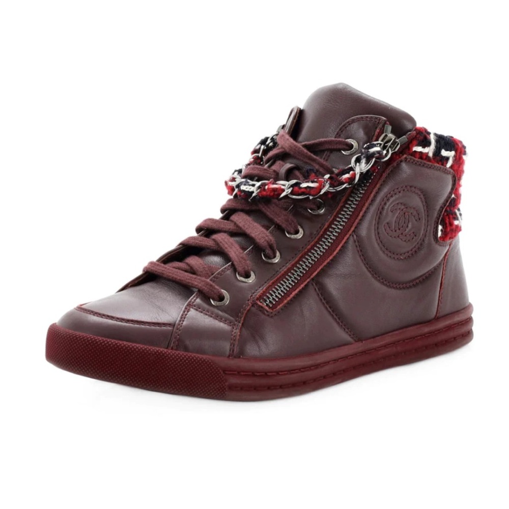 Chanel high top with chain.